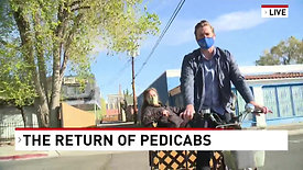 Brett Forrest tries out driving a pedicab