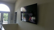 80"Samsung mounted in 2nd story stairwell
