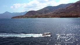 Dive boat with divers cruising - Alor - Indonesia