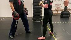 Teaching Molly to sit down into her punches