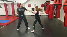 Padwork boxing drill with Cameron & Molly