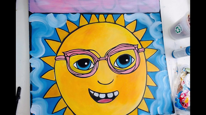 Painting a big happy sun