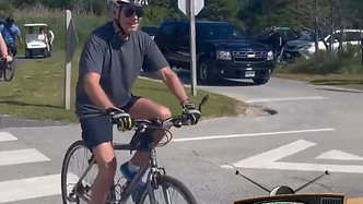 Biden's body double crashes bike on fathers day!