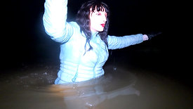 WetLook 241 girl in white jeans and rubber boots in deep water