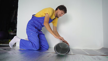 a-professional-master-of-underfloor-heating-instal-2022-04-08-19-32-30-utc