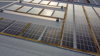 sunny-sun-light-over-solar-panel-array-2022-08-10-07-40-54-utc