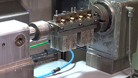 Inserting castings into a fixture for the milling process
