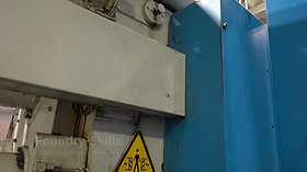 Back side of a larger hot chamber high pressure die casting machine