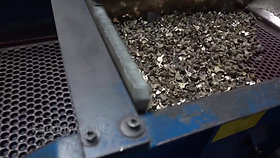 Vibratory grinding of small castings