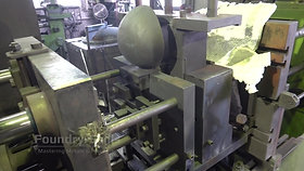 Core pull movement on a tilt casting machine