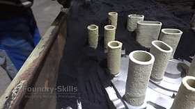 Furan resin bonded moulding material in hand moulding process