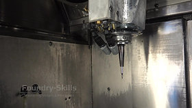 Interior of a CNC machine with milling head