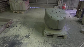 Spray coating of a larger sand core