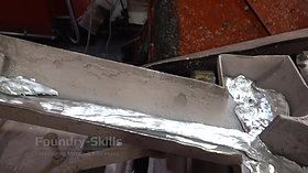 Ingot casting station detail view zinc melt
