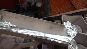 Ingot casting station detail view zinc melt