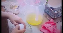 Breaking eggs for albumen