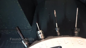 Different interchangeable milling heads of a CNC machine