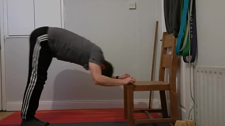 Hands elevated Pike Pushup